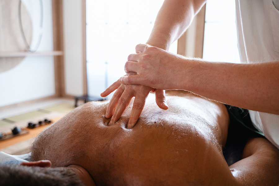 Back massage using tips of fingers