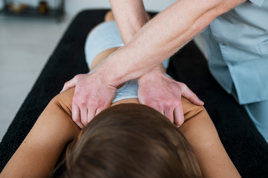 Woman in physical massage therapy session